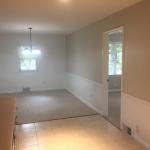 Additional view of dining room with no furniture and updated paint