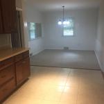 Dining room with no furniture and updated paint